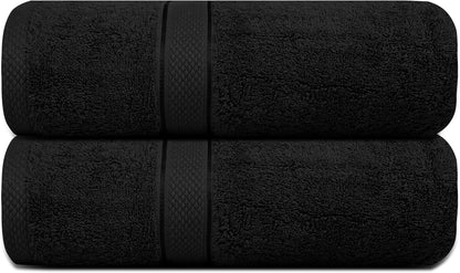 Plush ring spun cotton bath towels folded on a bath tub edge