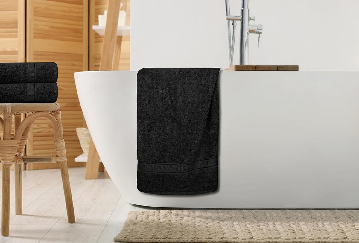 Hotel quality bath towels shown in a modern bathroom