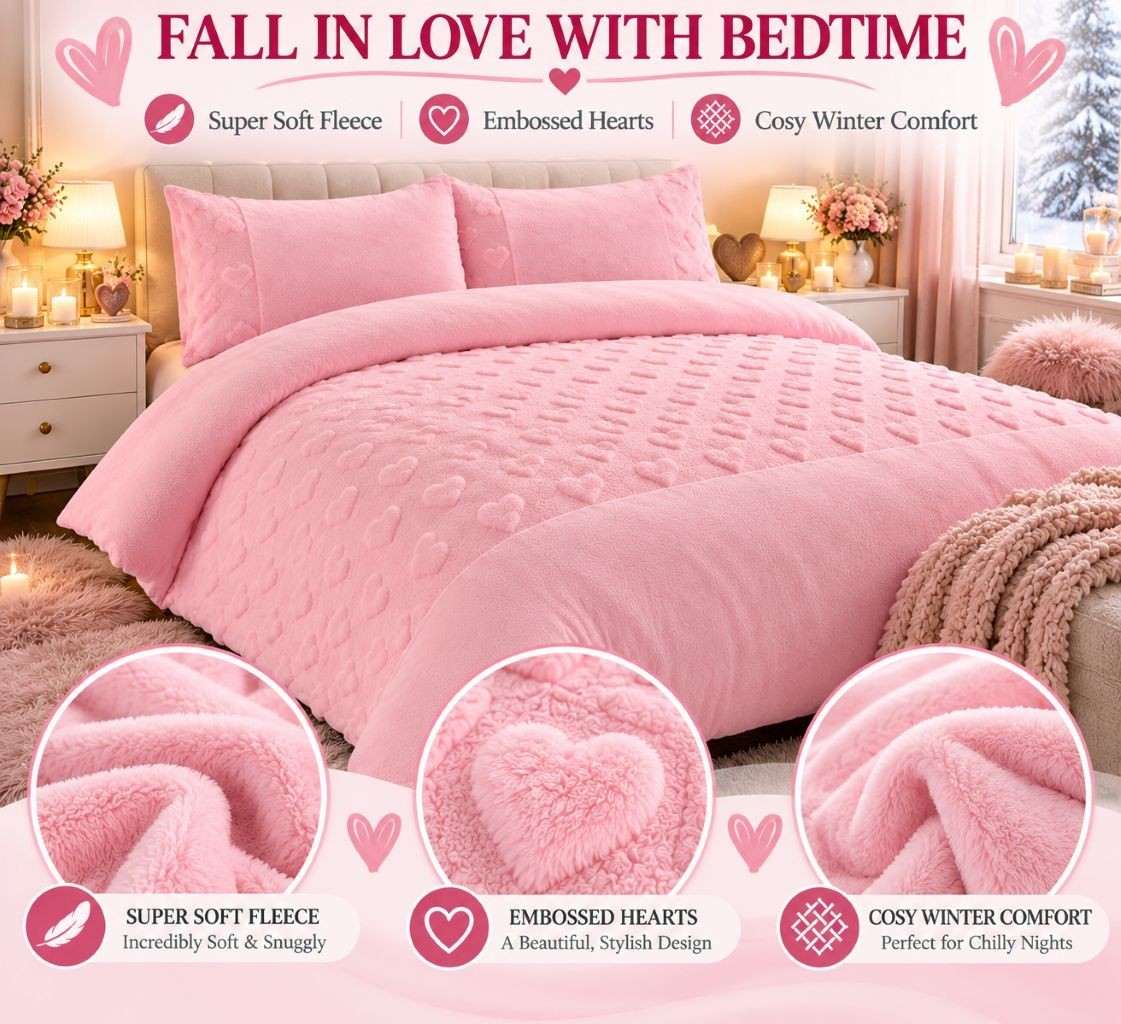 Teddy hearts fleece throw blanket draped over the end of a bed