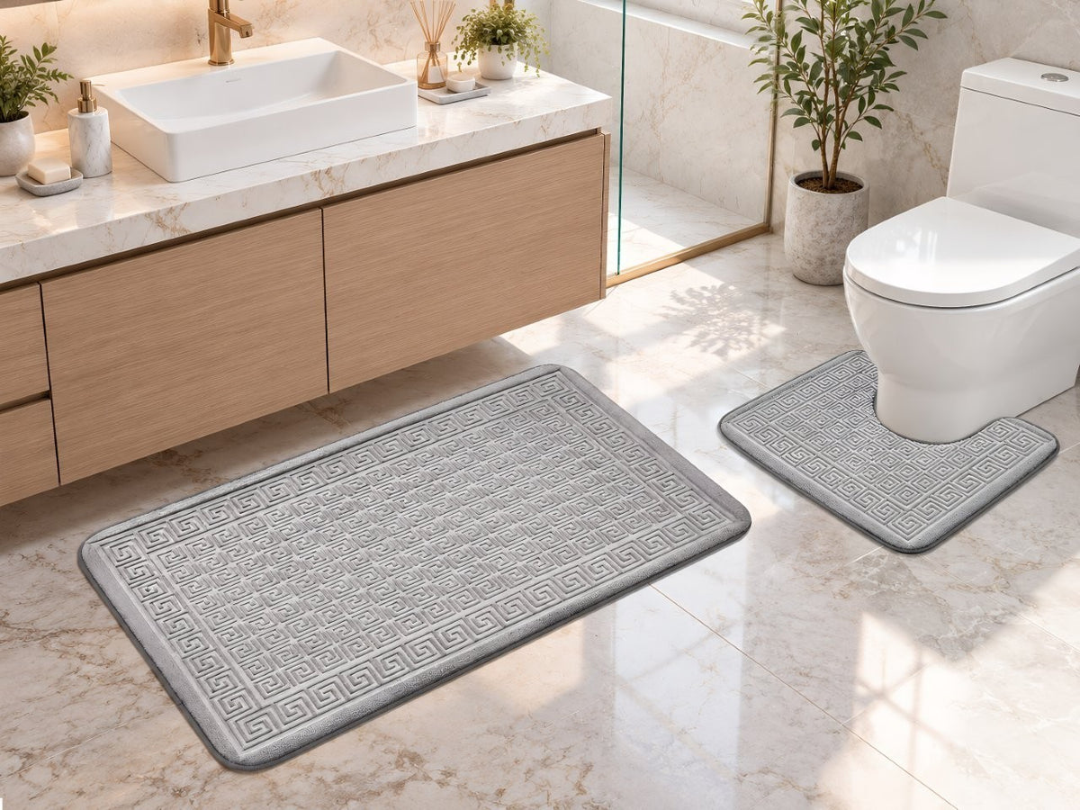 Bare feet stepping onto soft memory foam bath mat after a shower