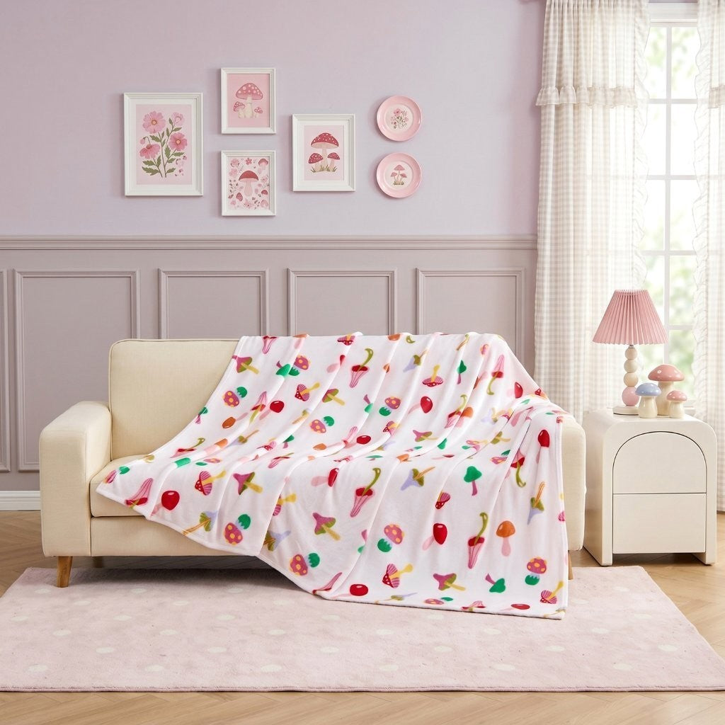 Daisy Green floral print fleece throw on a reading chair