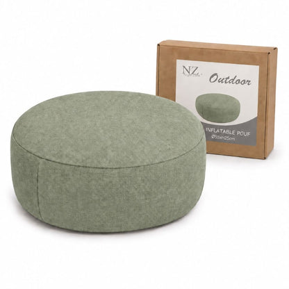 Green round inflatable footstool on a balcony with outdoor furniture