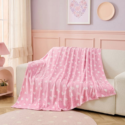 Fleece throw used as a cosy movie-night sofa cover