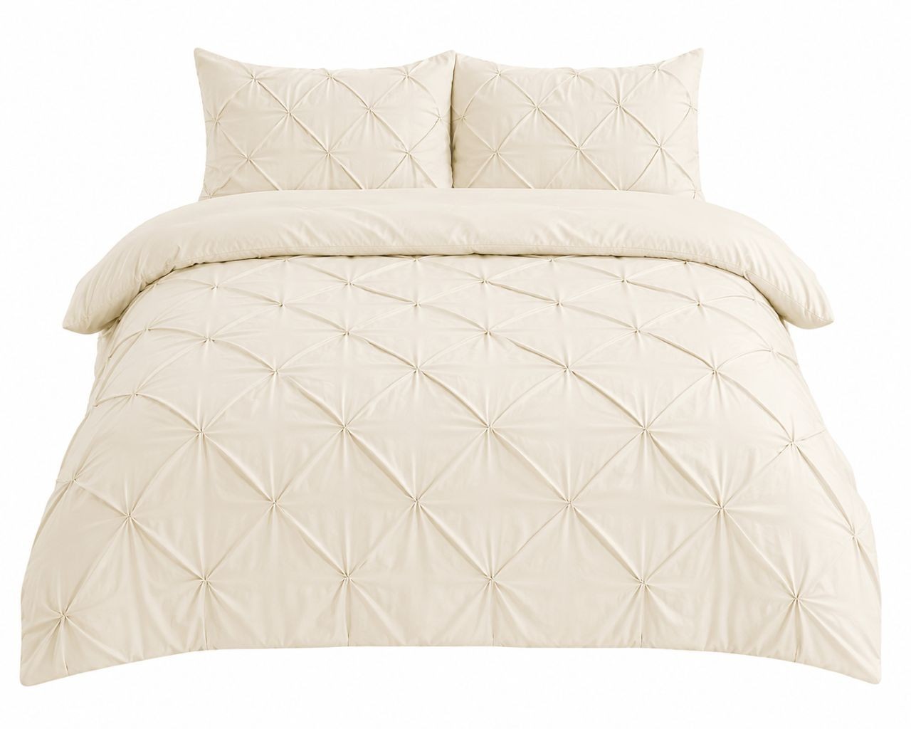 Cream pintuck pleated duvet cover in a warm neutral bedroom