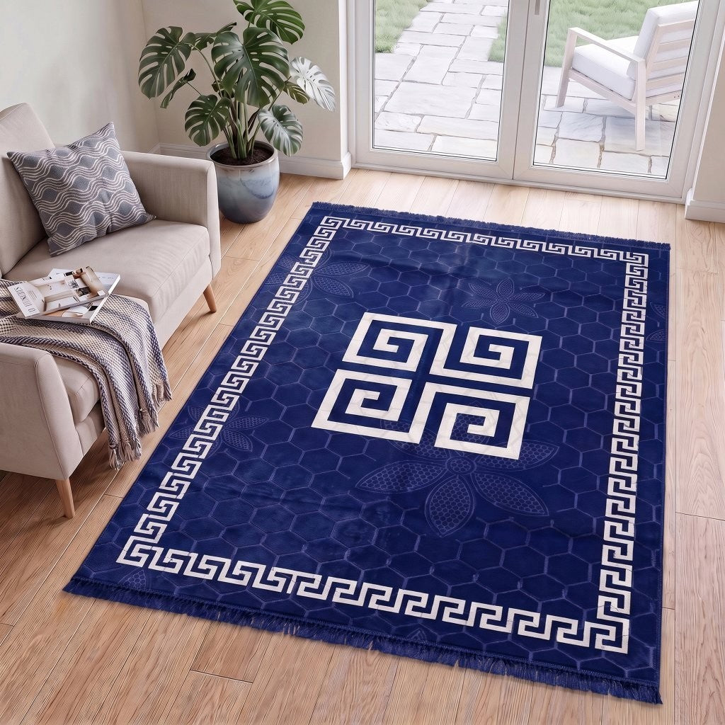 Greek key rug beside a bed for warm underfoot comfort
