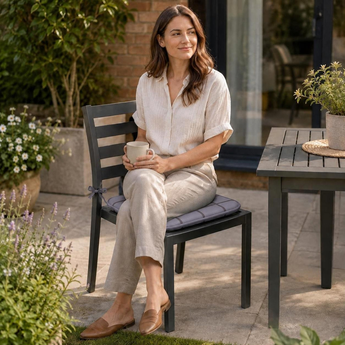 Waterproof seat cushions used on garden chairs on a sunny patio
