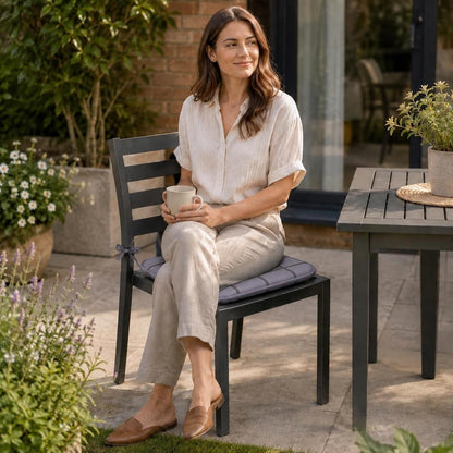 Waterproof seat cushions used on garden chairs on a sunny patio