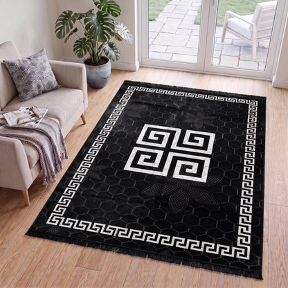 Greek key rug in a dining room framing the table setting