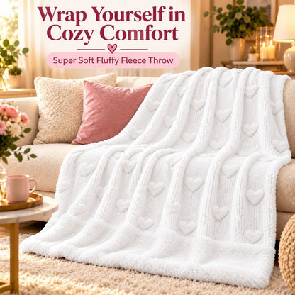 Pink teddy fleece quilt cover set on a double bed with cushions