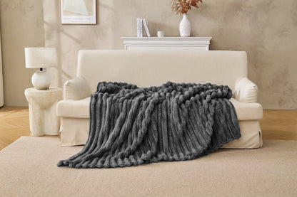 Natural colour ribbed fleece throw in a light neutral bedroom