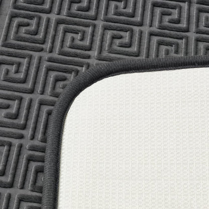 Close-up of Greek key border pattern on cushioned bath mat