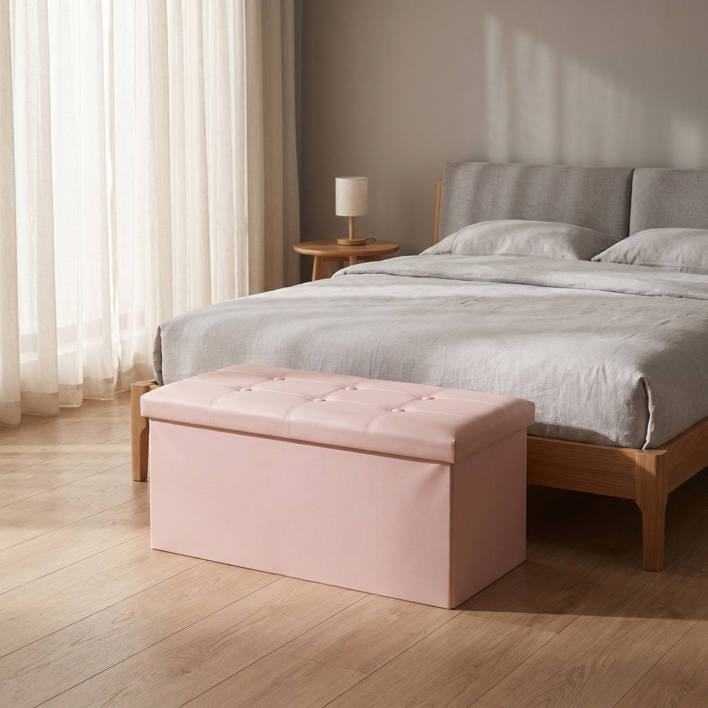 Storage ottoman shown in black faux leather with tufted seat detail