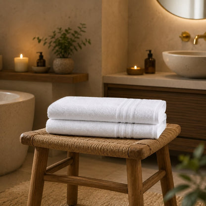 Cotton bath mat with plush pile beside a shower