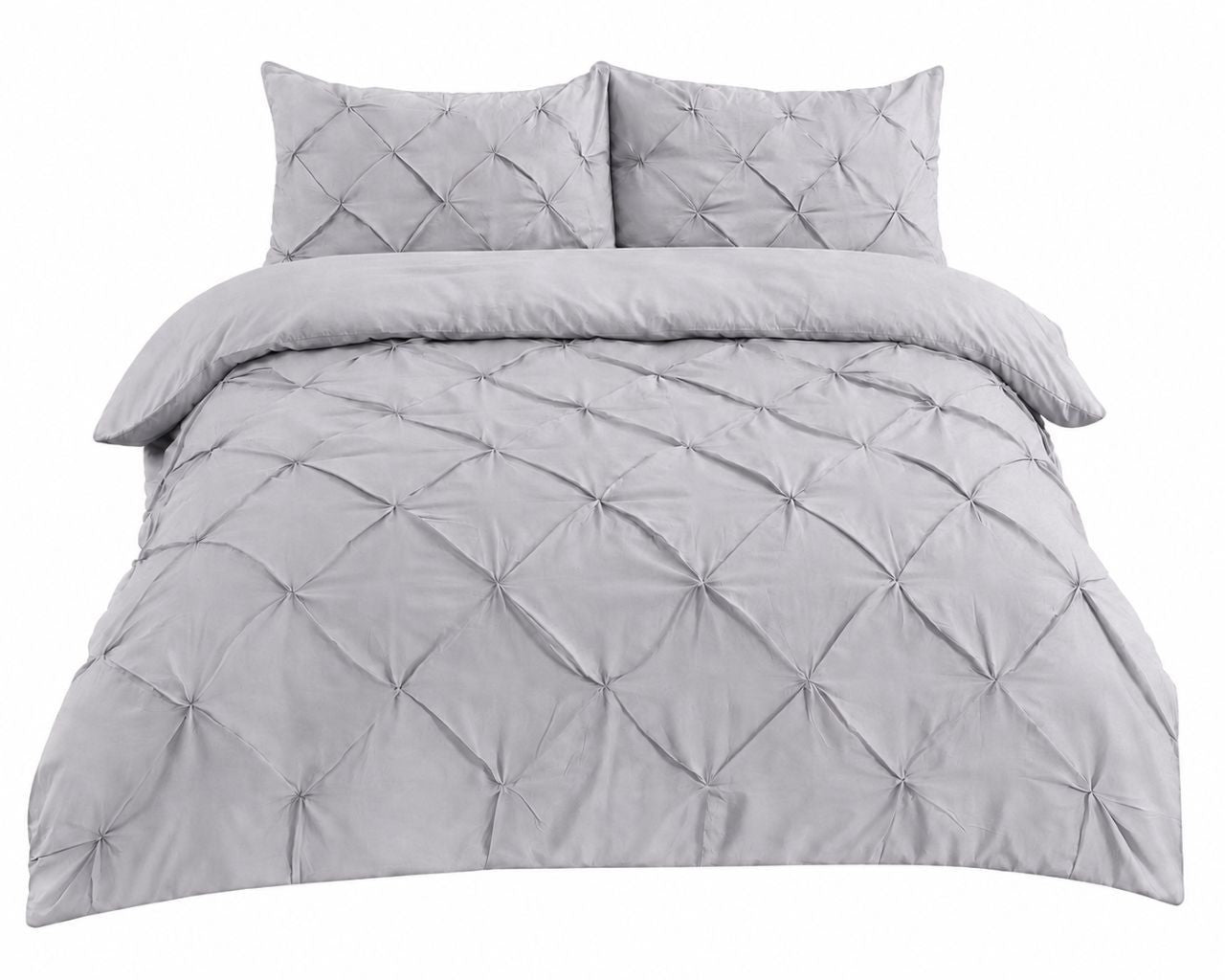 Pintuck duvet cover styled in a guest bedroom