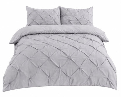Pintuck duvet cover styled in a guest bedroom