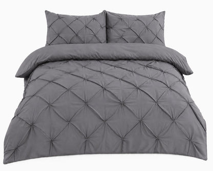 Grey pintuck pleated duvet cover in a modern bedroom