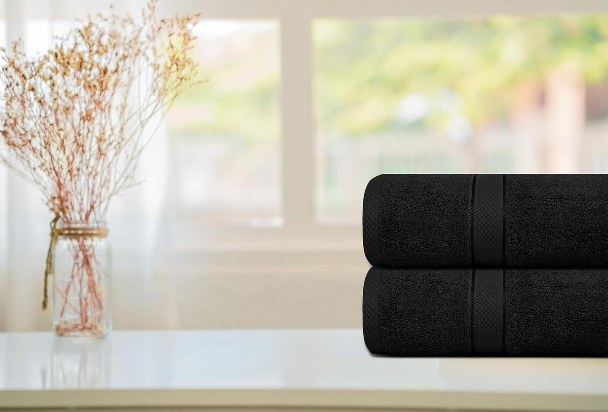 Two piece cotton bath towel set folded in the bathroom