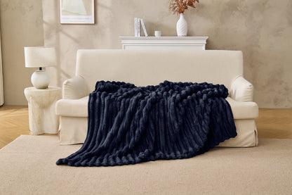 Lightweight fleece throw rolled up for travel and camping