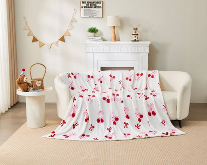 Pink Hearts all-over print throw blanket in a cosy living room