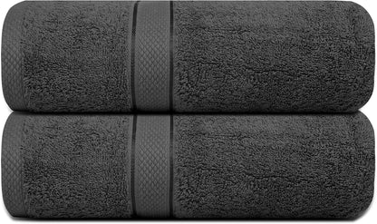 Grey bath towel set neatly folded on a wooden bench
