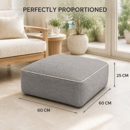 Removable zipped cover being opened on the inflatable square footstool