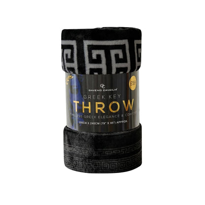 A folded black throw blanket with a gray Greek key pattern, wrapped in a paper band labeled 'Gavend Savailia Greek Key Throw'.