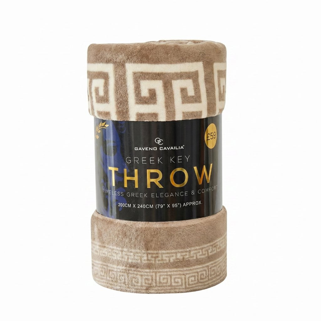 A folded plush throw blanket with a beige and cream Greek key pattern, wrapped in a black paper band labeled 'GAVENDIANNA GREEK KEY THROW'.
