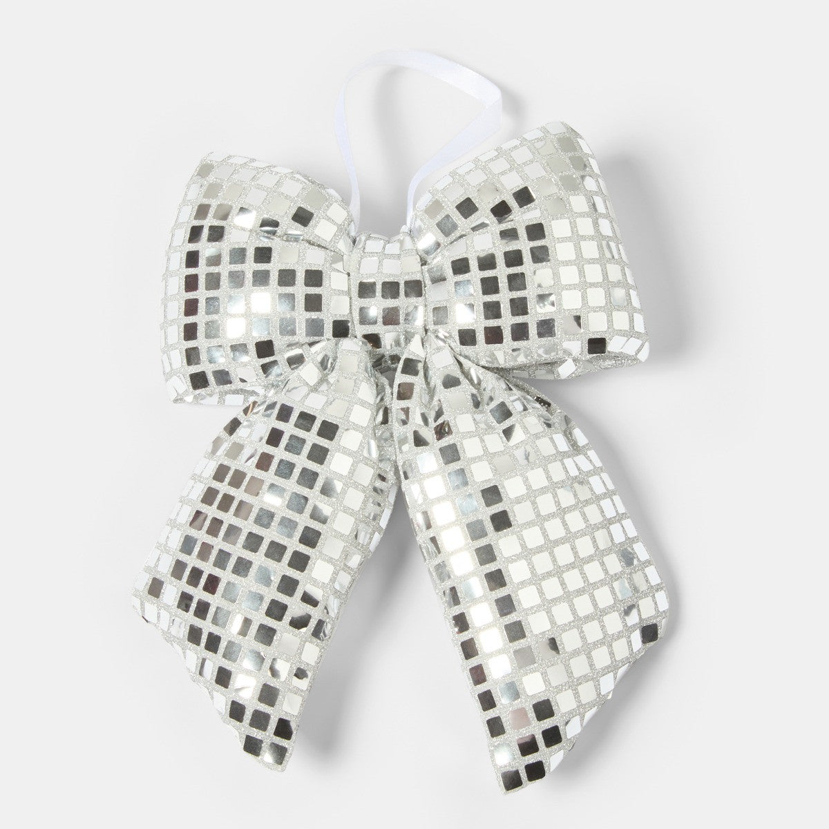 Disco ball silver Christmas bow hanging on tree branch