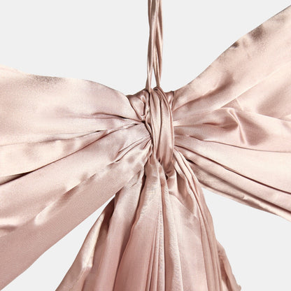 Cream oversized bow as tree topper - Nordic Christmas styling