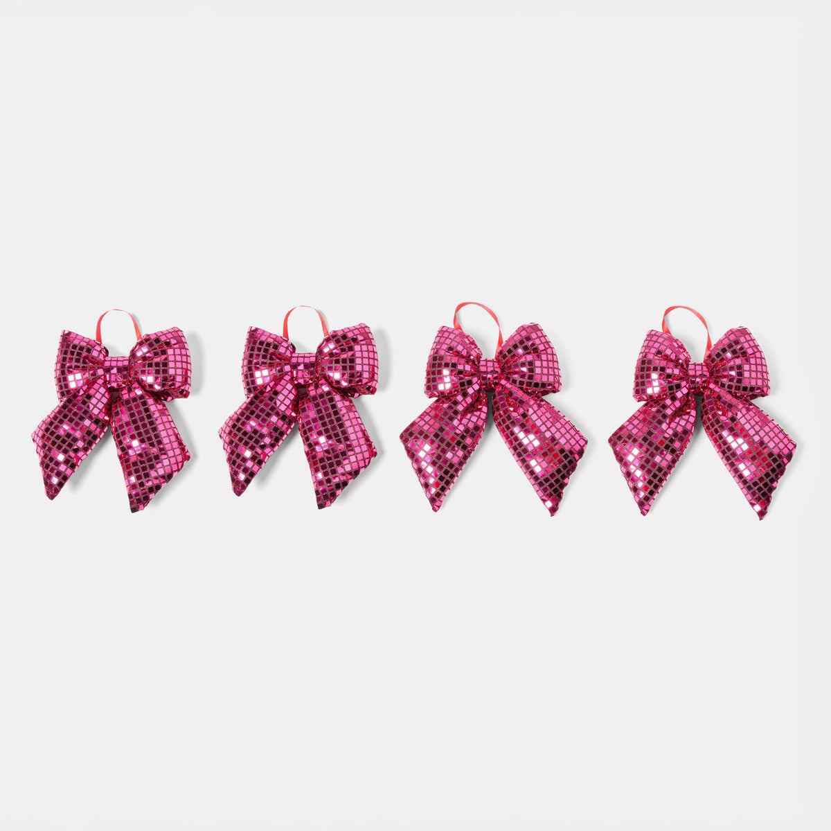 Mirrored hot pink Christmas bow close-up - disco ball Pinkmas ornament