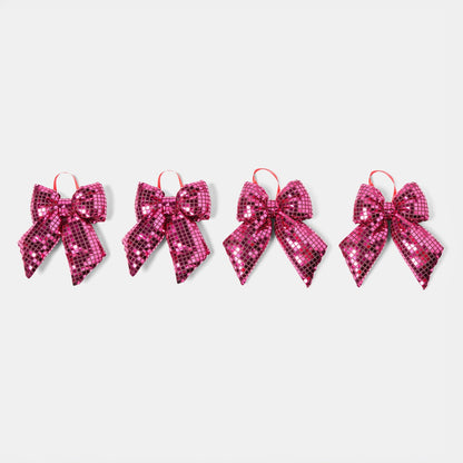 Mirrored hot pink Christmas bow close-up - disco ball Pinkmas ornament
