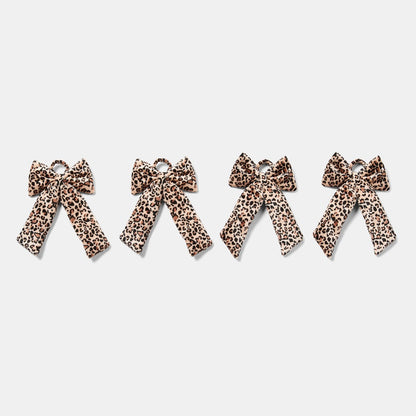 Natural leopard print bow close-up - trend Christmas ornament detail