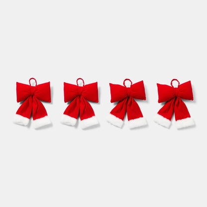 Classic red hanging bow close-up - Christmas ornament detail