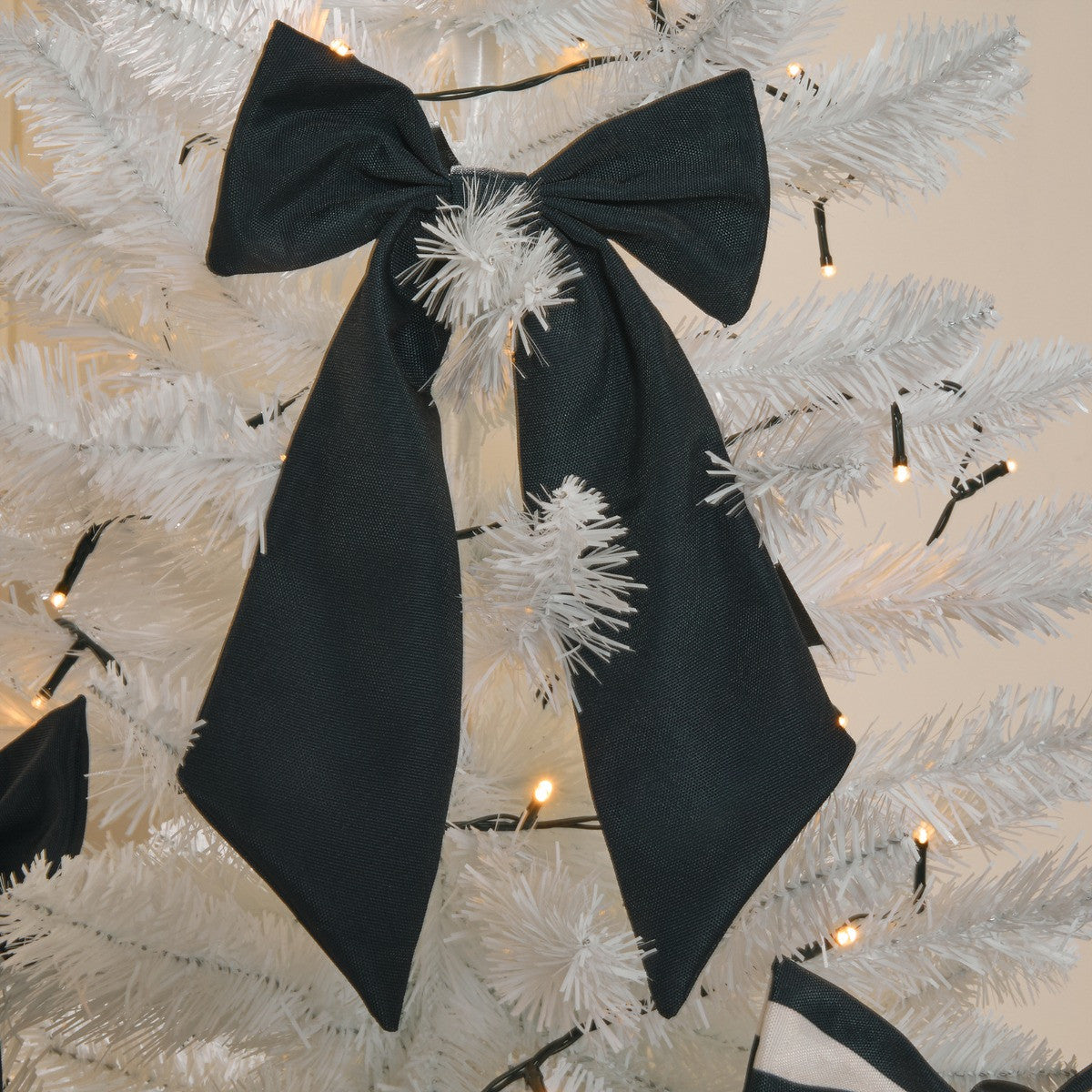Monochrome striped Christmas tree topper close-up - statement decoration