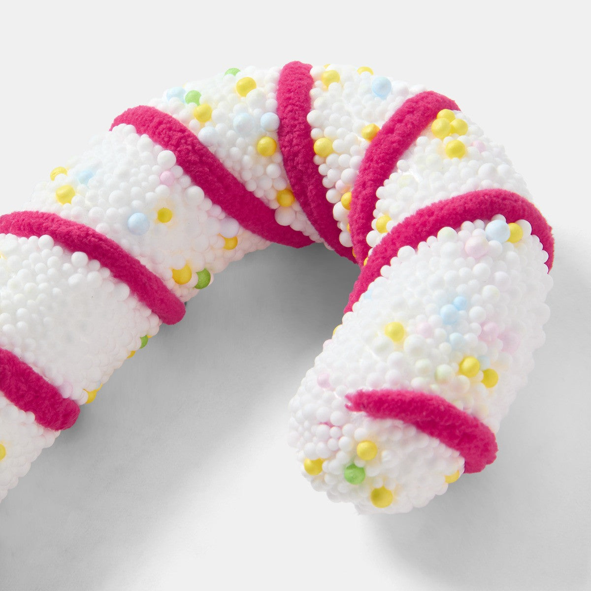 Pinkmas candy cane decoration styled with festive display